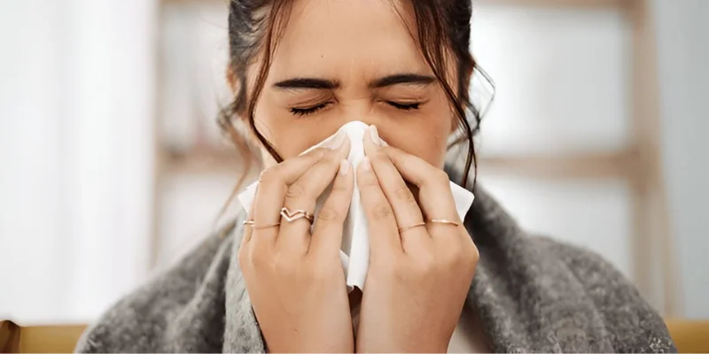 Wicker chair on blue rug