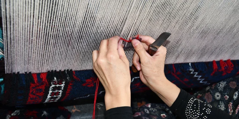 Wicker chair on blue rug